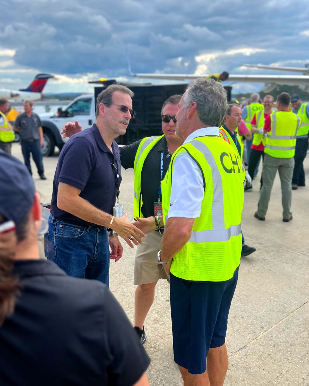 Lew Bleiweis, A.A.E., President + CEO Greeting aviation community partners on ramp during relief operations at AVL. 